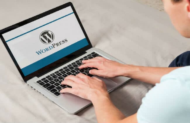 Wordpress logo on a laptop