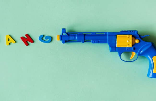 Toy gun with the word Bang spelled out