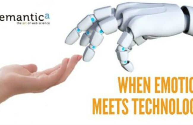 Human hand touching a robot hand