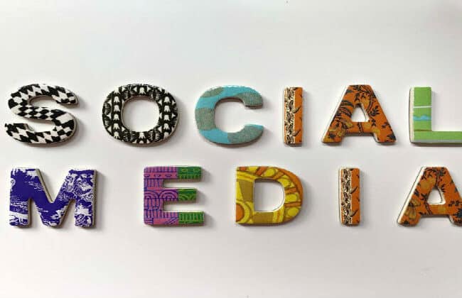 Social media spelled out in colorful materials