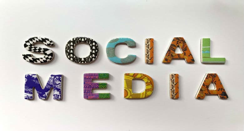 Social media spelled out in colorful materials