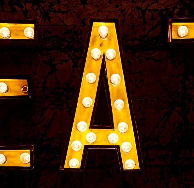 Lighted sign saying "EAT"